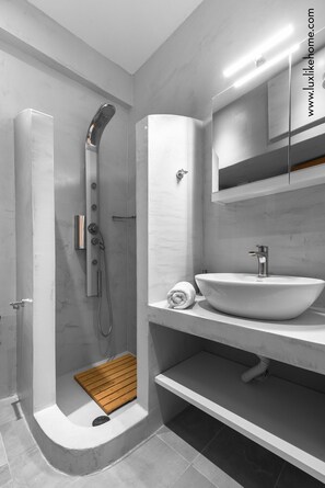 Hair dryer, towels, soap, shampoo