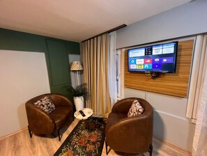 Standard Room | Living area | 32-inch LCD TV with satellite channels, TV - Galata Aristo (Istanbul)