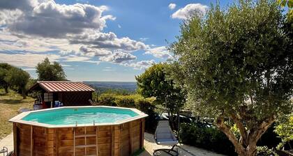 Charming windmill between nature and sea