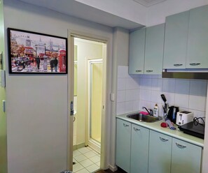Fridge, microwave, electric kettle, toaster