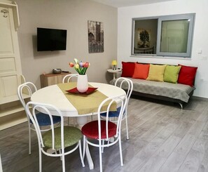 Appartement Supérieur, 2 chambres, terrasse, vue jardin | Coin séjour