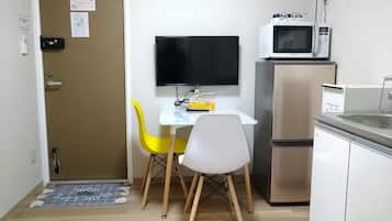 32-inch flat-screen TV with digital channels, TV