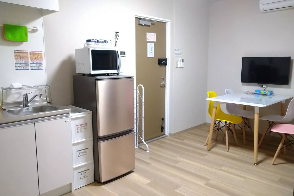 Comfort Apartment (401) | Living area | 32-inch flat-screen TV with digital channels, TV