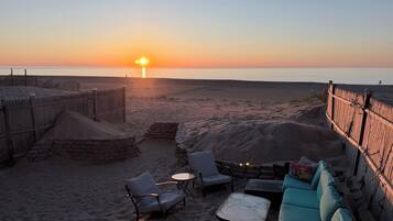 On the beach, sun loungers
