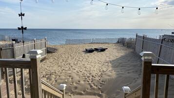 On the beach, sun-loungers