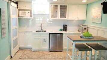 Fridge, microwave, coffee/tea maker, toaster