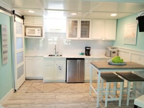 Fridge, microwave, coffee/tea maker, toaster