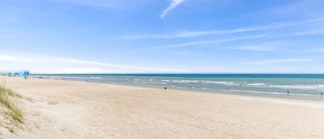 On the beach, sun loungers, beach towels