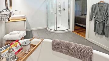 Bathtub, hair dryer, towels