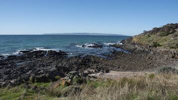 Na praia, espreguiçadeiras