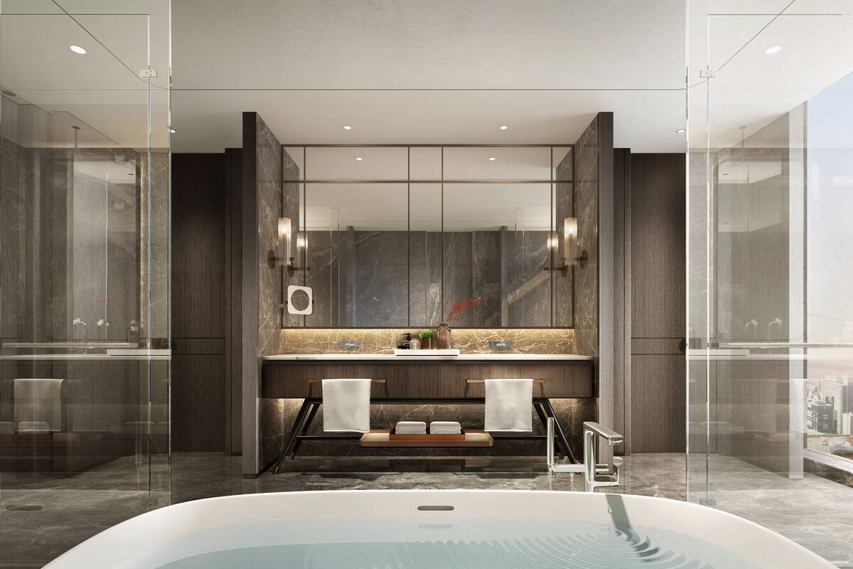 Ein modernes Badezimmer mit einer Duschkabine, einem мраморном Waschtisch und einer Badewanne.