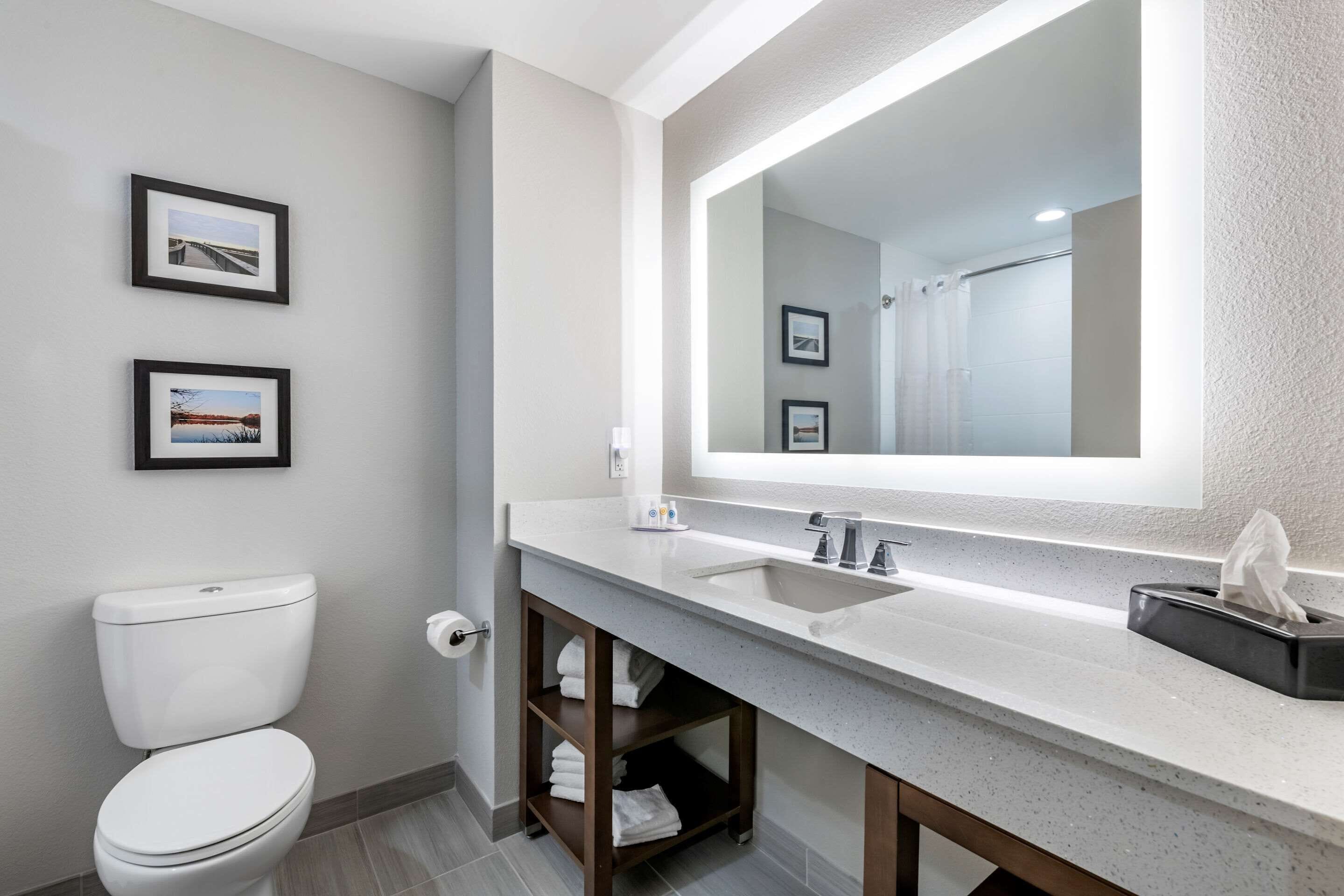 premium bedding, memory-foam beds, desk, laptop workspace