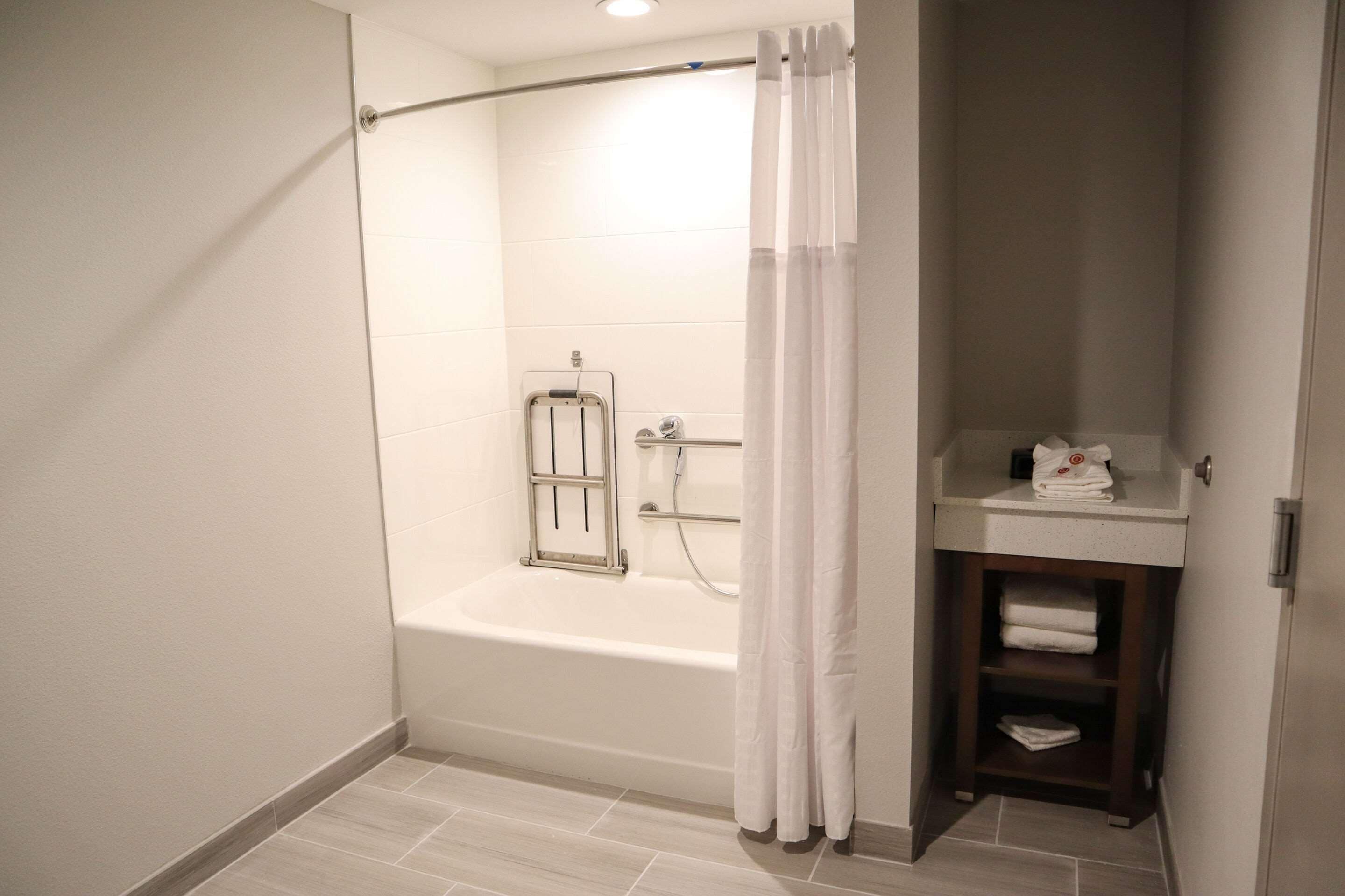 premium bedding, memory-foam beds, desk, laptop workspace