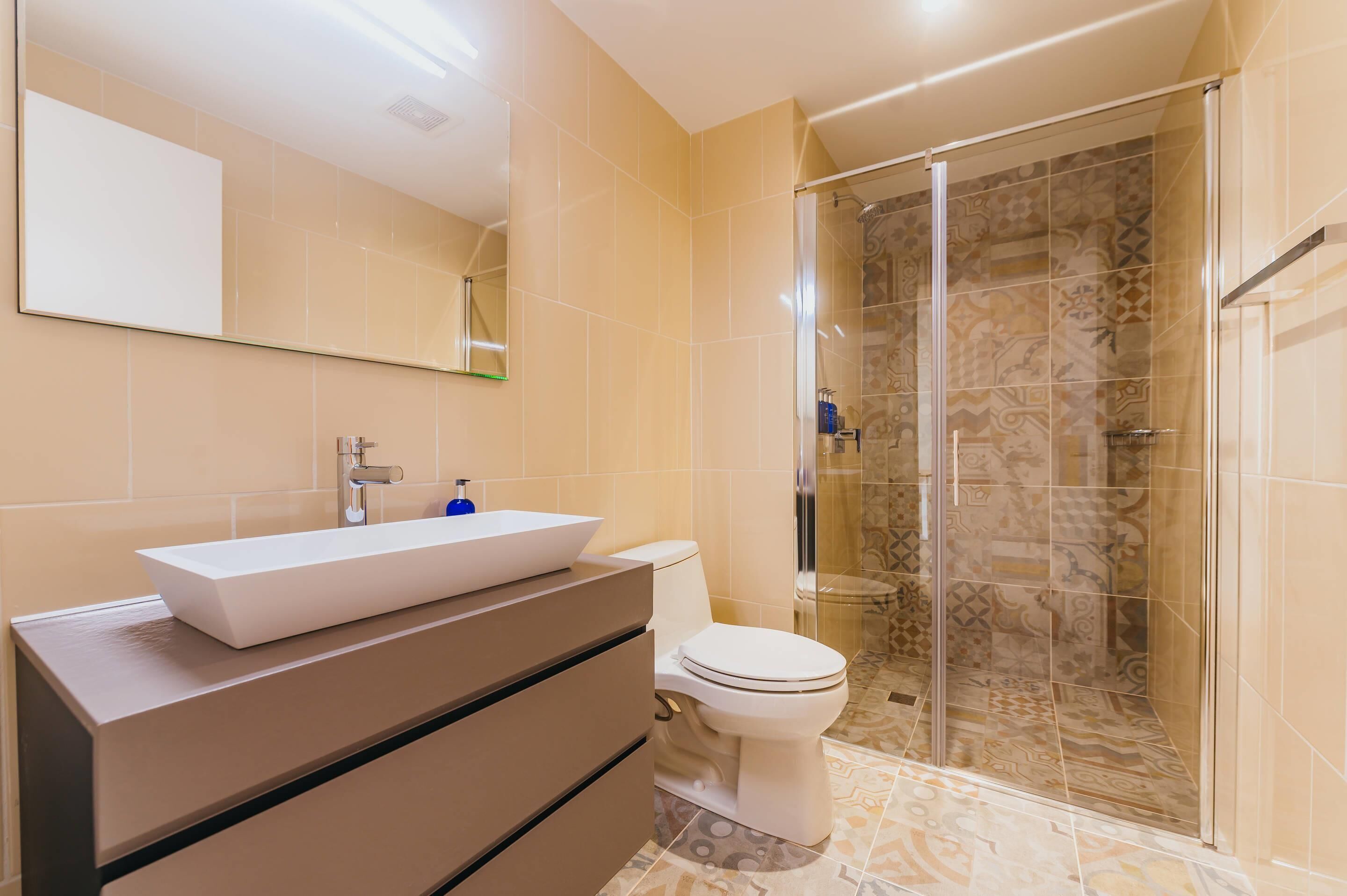 hair dryer, bathrobes, slippers, towels