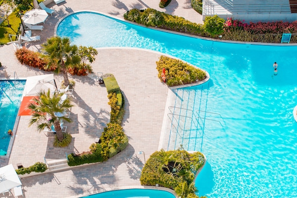 3 outdoor pools, pool cabanas (surcharge), pool umbrellas