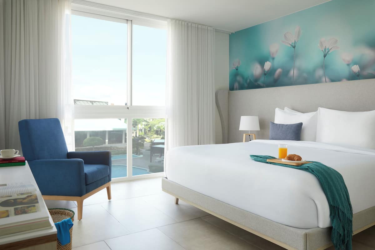Suite, 1 Bedroom, Non Smoking, Pool View (King Bed) | Premium bedding, memory foam beds, in-room safe, iron/ironing board