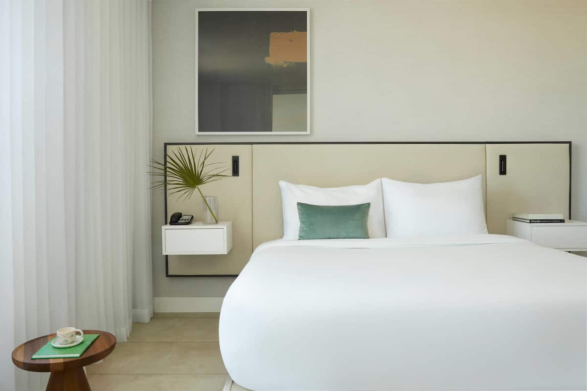 Suite, Non Smoking, Ocean View (1 King Bed, 2 Single Beds) | Premium bedding, memory foam beds, in-room safe, iron/ironing board