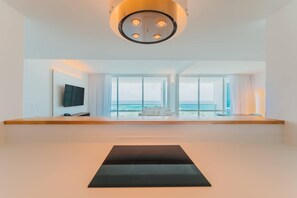 Suite, Non Smoking, Ocean View (2 King & 2 Single Beds) | Premium bedding, memory foam beds, in-room safe, iron/ironing board - Radisson Blu Aruba (Noord)