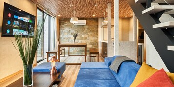 55-inch flat-screen TV with digital channels, TV, fireplace