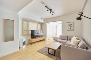Chambre | Coin séjour