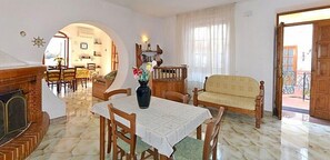 Apartment, 3 Bedrooms, Smoking, Terrace | Living room | Fireplace, books