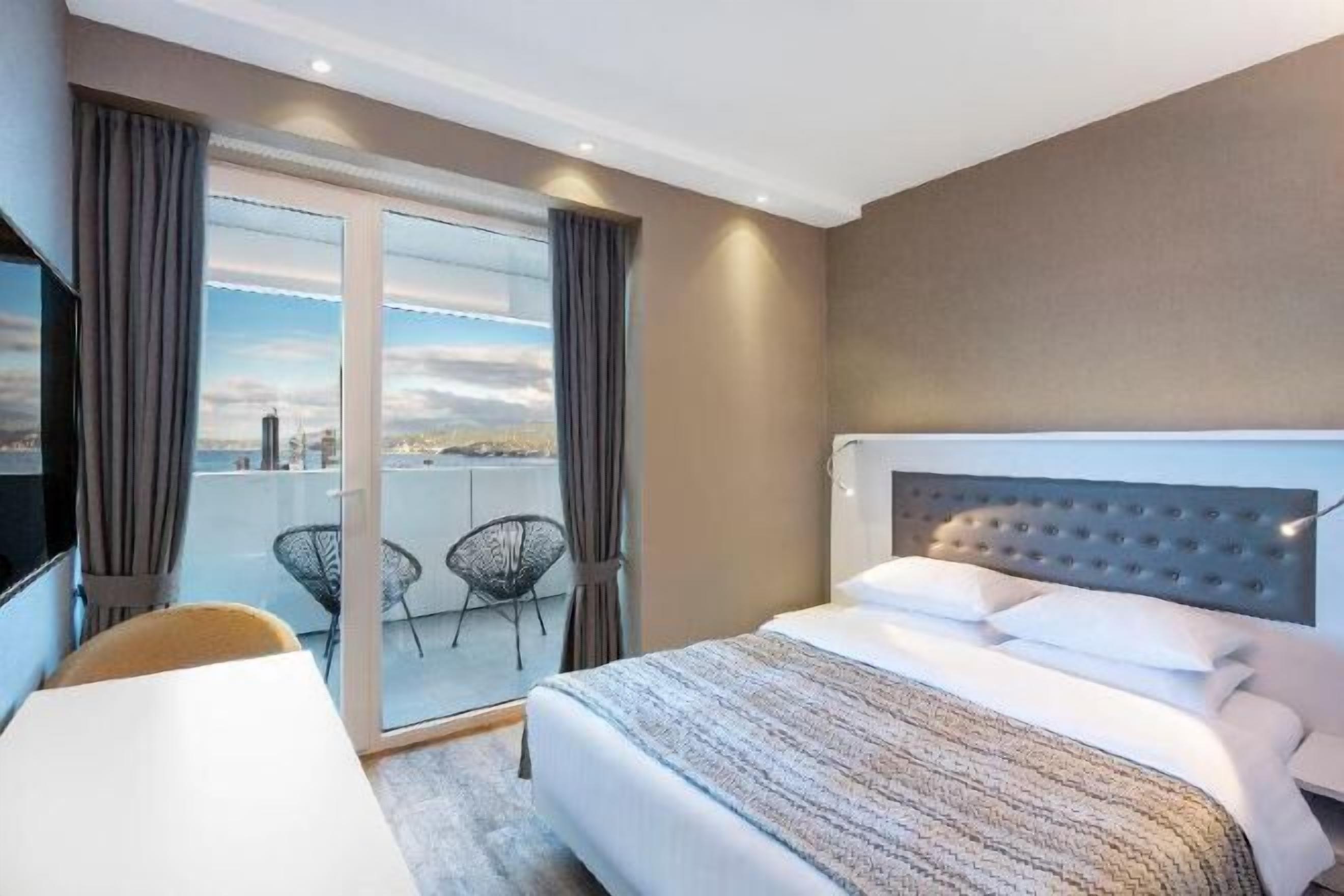 Minibar, blackout curtains, soundproofing, iron/ironing board