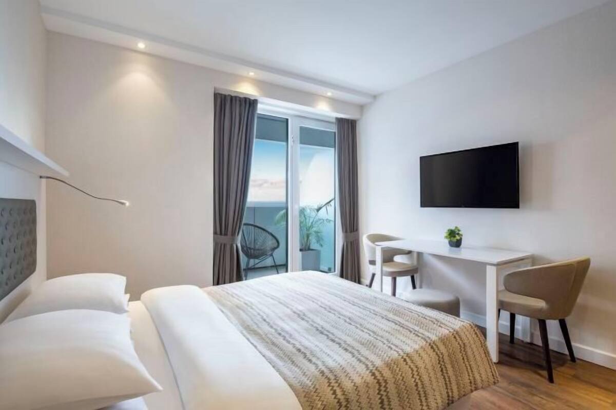 Minibar, blackout drapes, soundproofing, iron/ironing board
