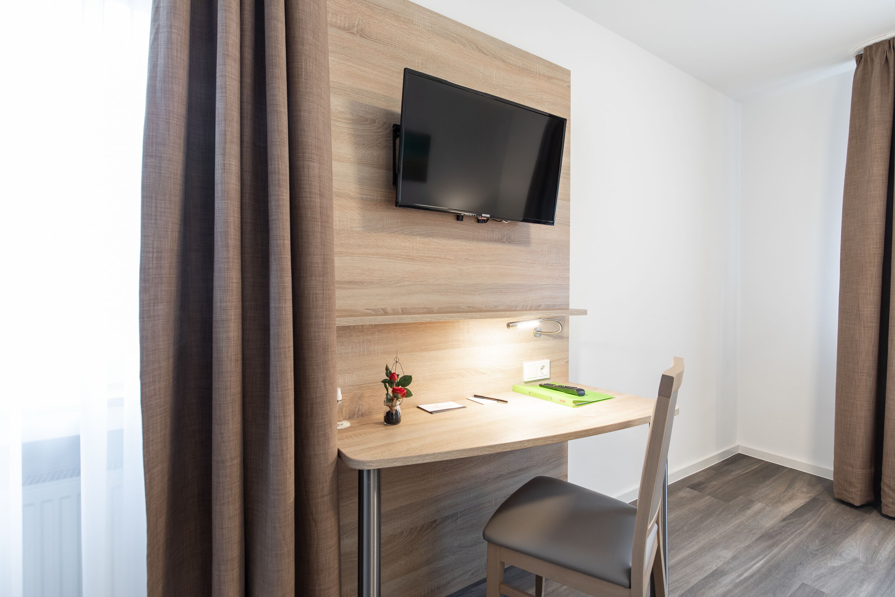 standard double room | living area | led tv