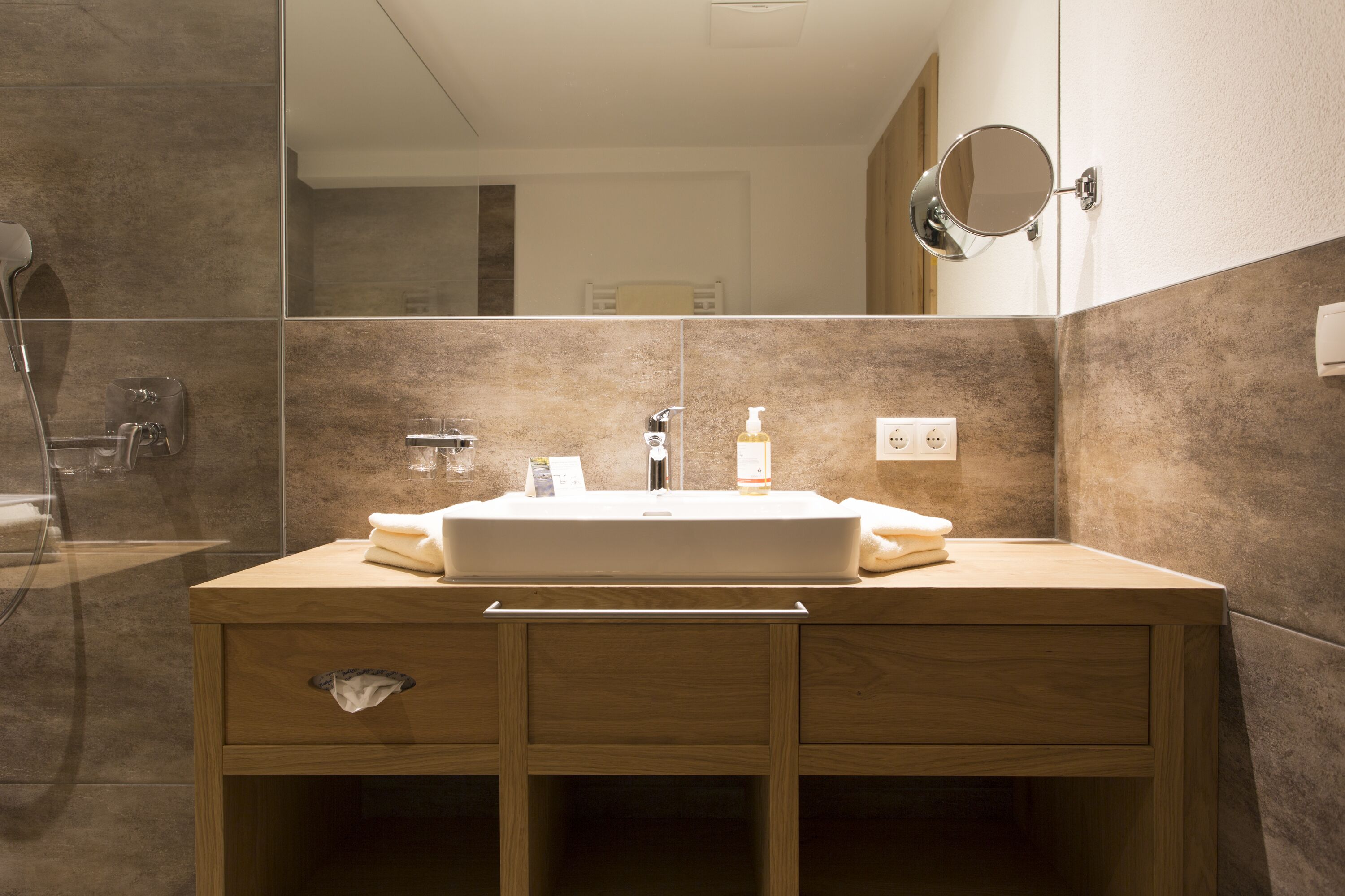 shower, hair dryer, bathrobes, slippers