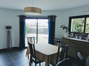 Enjoy meals with family and friends in this dining area, complete with a table for four and comfortable seating.