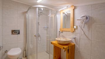 Deluxe Double Room, Sea View, Garden Area | Bathroom | Shower, hydromassage showerhead, hair dryer, slippers