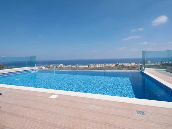 Enjoy a refreshing swim with a stunning ocean view from the rooftop pool.