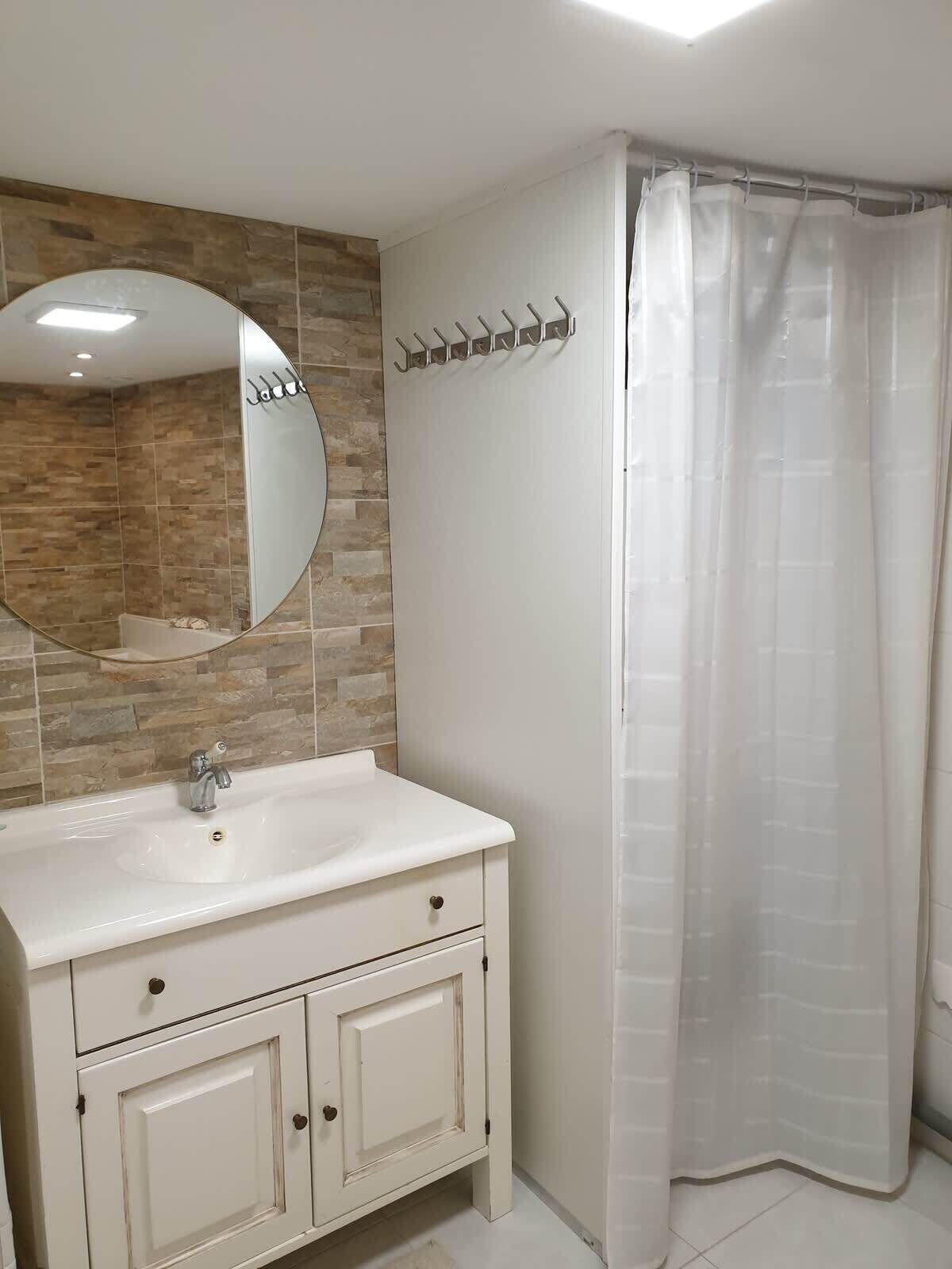 Bathtub, jetted tub, hair dryer, toilet paper