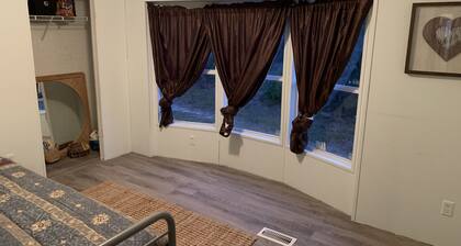 An acre of Country Living not far from the Beach!