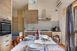 Standard Apartment, 2 Bedrooms (Mario) | Private kitchen | Full-sized fridge, microwave, stovetop, cookware/dishes/utensils - Residence Ulivo D'Oro (Torricella)