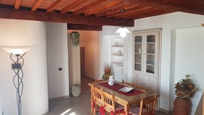 Apartment, 1 Bedroom, Smoking, Balcony | Dining - "la Casa Delle Bimbe" (Monteverdi Marittimo)