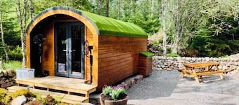 Luxury Glamping Pod surrounded by nature.