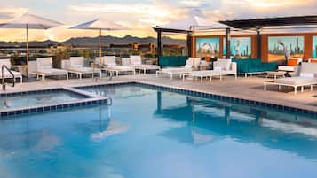 Outdoor pool, open 8:00 AM to 10:00 PM, cabanas (surcharge)