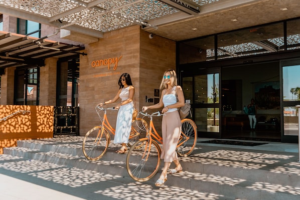 A building entrance with a sign reading "canopy" and a staircase leading up to it. - Canopy by Hilton Scottsdale Old Town (Scottsdale)