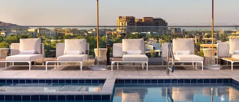 Outdoor pool, open 8:00 AM to 10:00 PM, cabanas (surcharge)