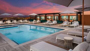 Outdoor pool, open 8:00 AM to 10:00 PM, pool cabanas (surcharge)