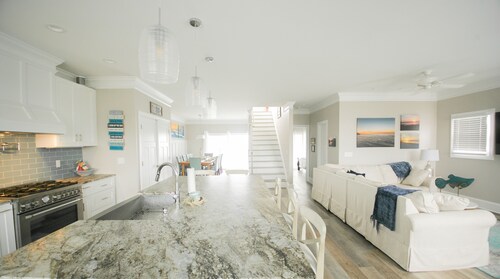 Canal Front Home-3-minute walk to beach with private boat dock