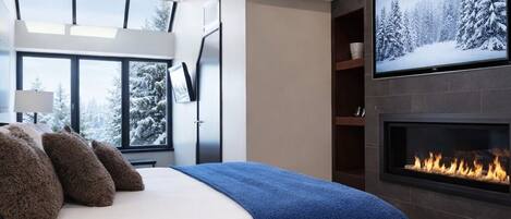 Tabla de planchar con plancha, wifi gratis y ropa de cama