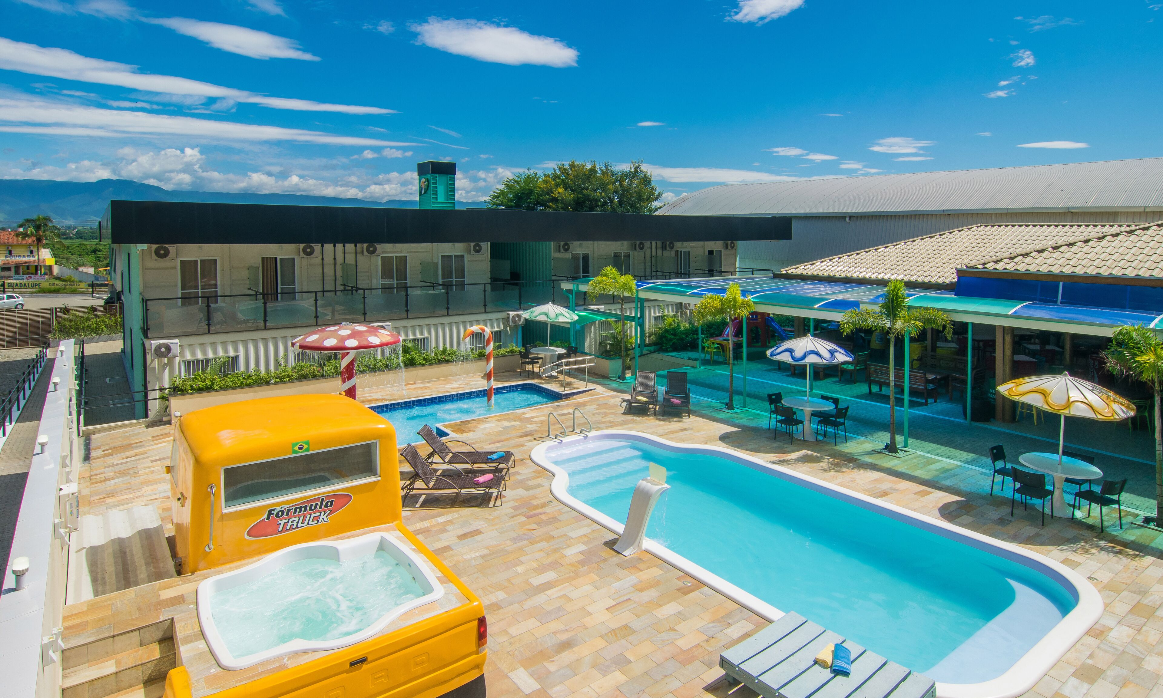 2 outdoor pools, open 9:00 am to 9:00 pm, pool loungers