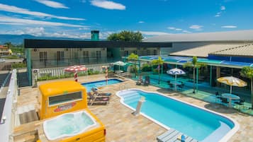 2 outdoor pools, open 9:00 AM to 9:00 PM, pool loungers