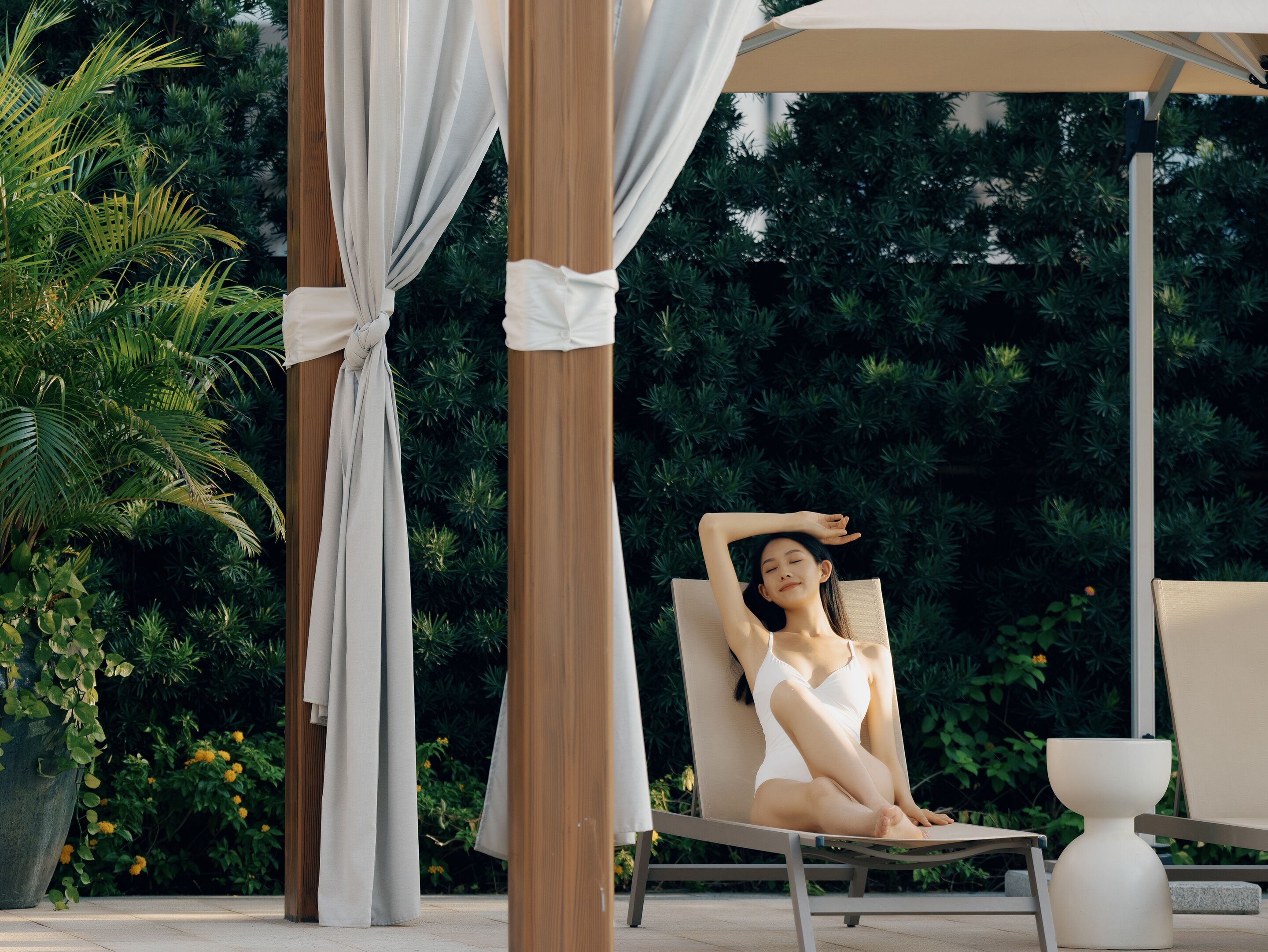 Outdoor pool, open 6:00 AM to 10:00 PM, pool umbrellas, pool loungers