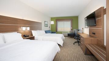 Desk, laptop workspace, bed sheets