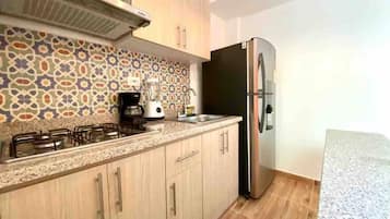 Microwave, oven, stovetop, coffee/tea maker