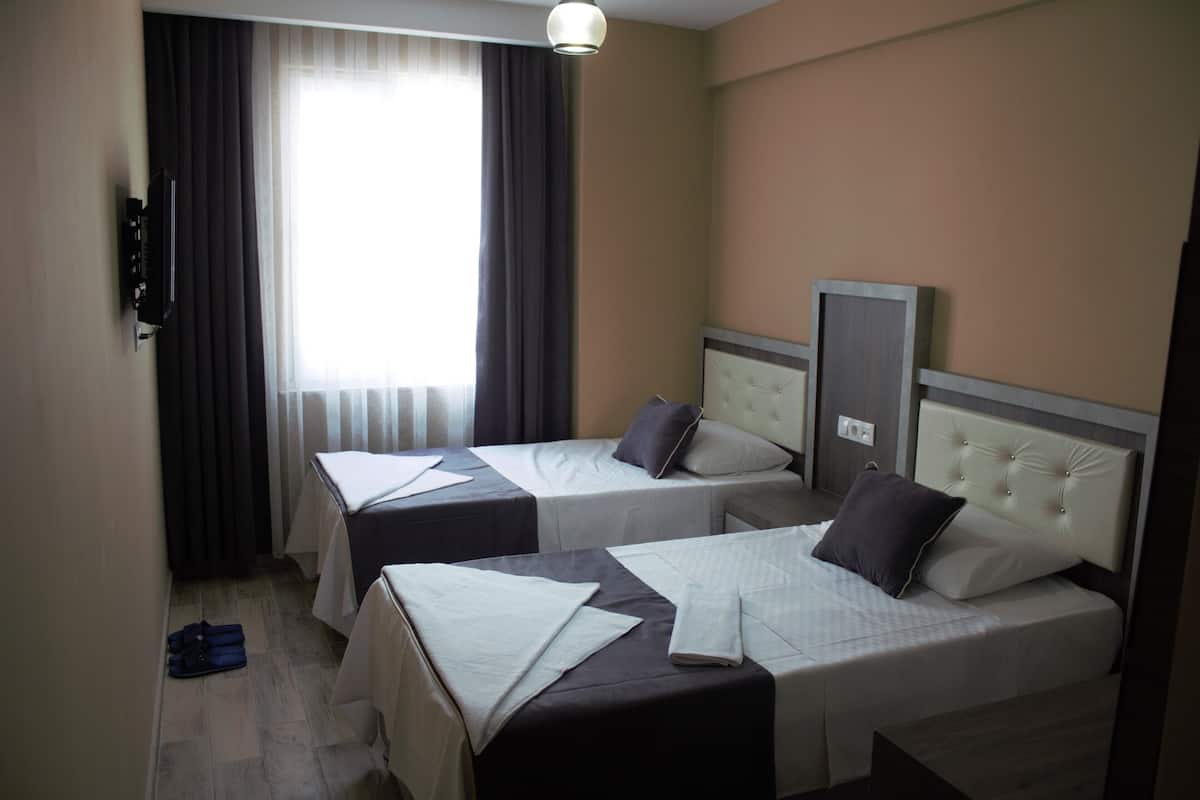 Premium bedding, down duvets, Select Comfort beds, minibar