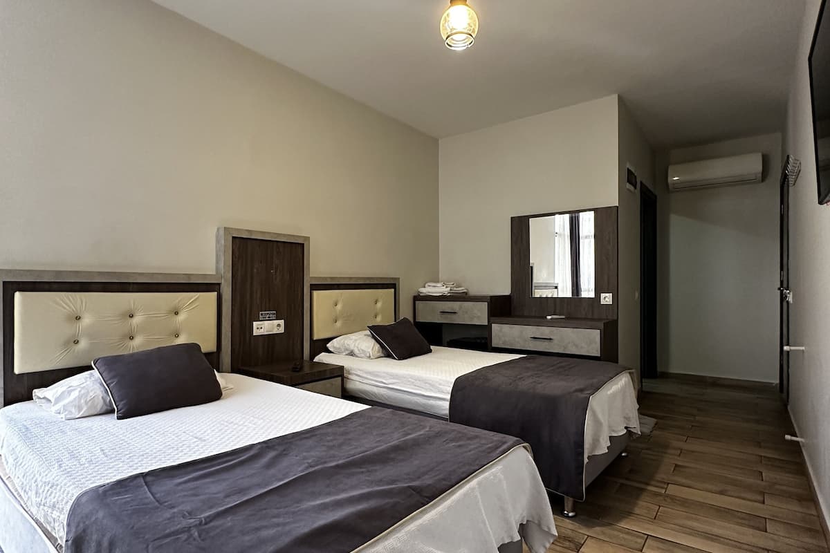Premium bedding, down duvets, Select Comfort beds, minibar